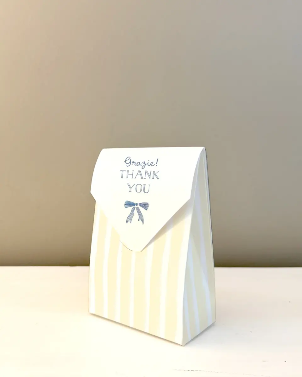 This is a 3.5" x 5.5" Wedding Favor Boxe called Ciao Baby printed in full color with Gold foil