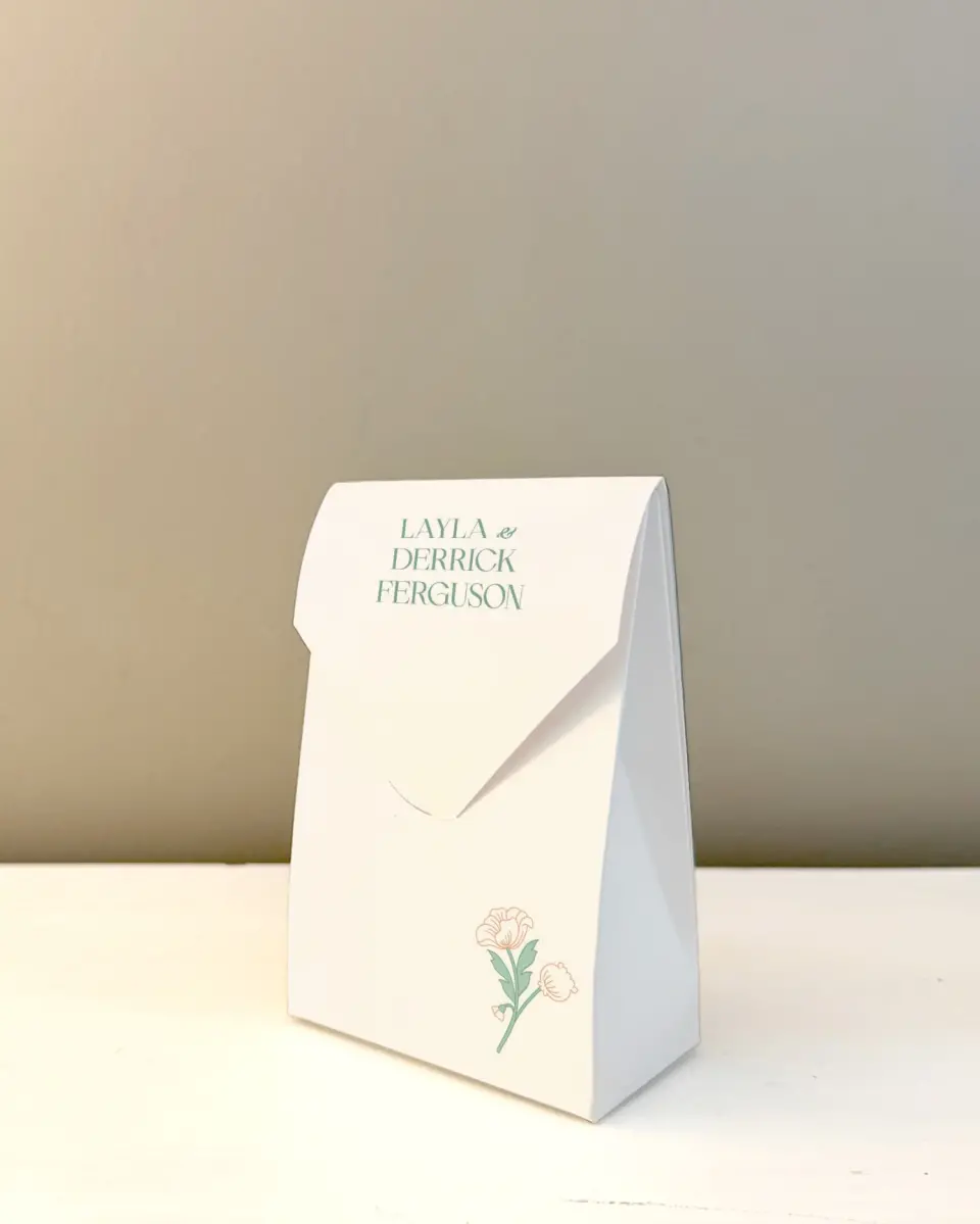 This is a 3.5" x 5.5" Wedding Favor Boxe called Vintage Dream printed in full color with Rose Gold foil