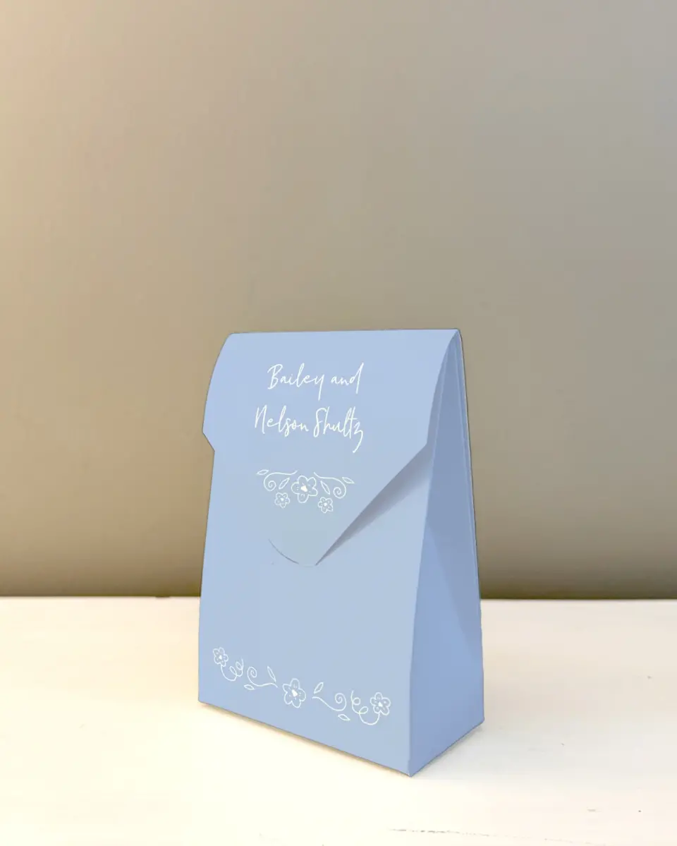 This is a 3.5" x 5.5" Wedding Favor Boxe called Framed in Flowers printed in full color with Rose Gold foil