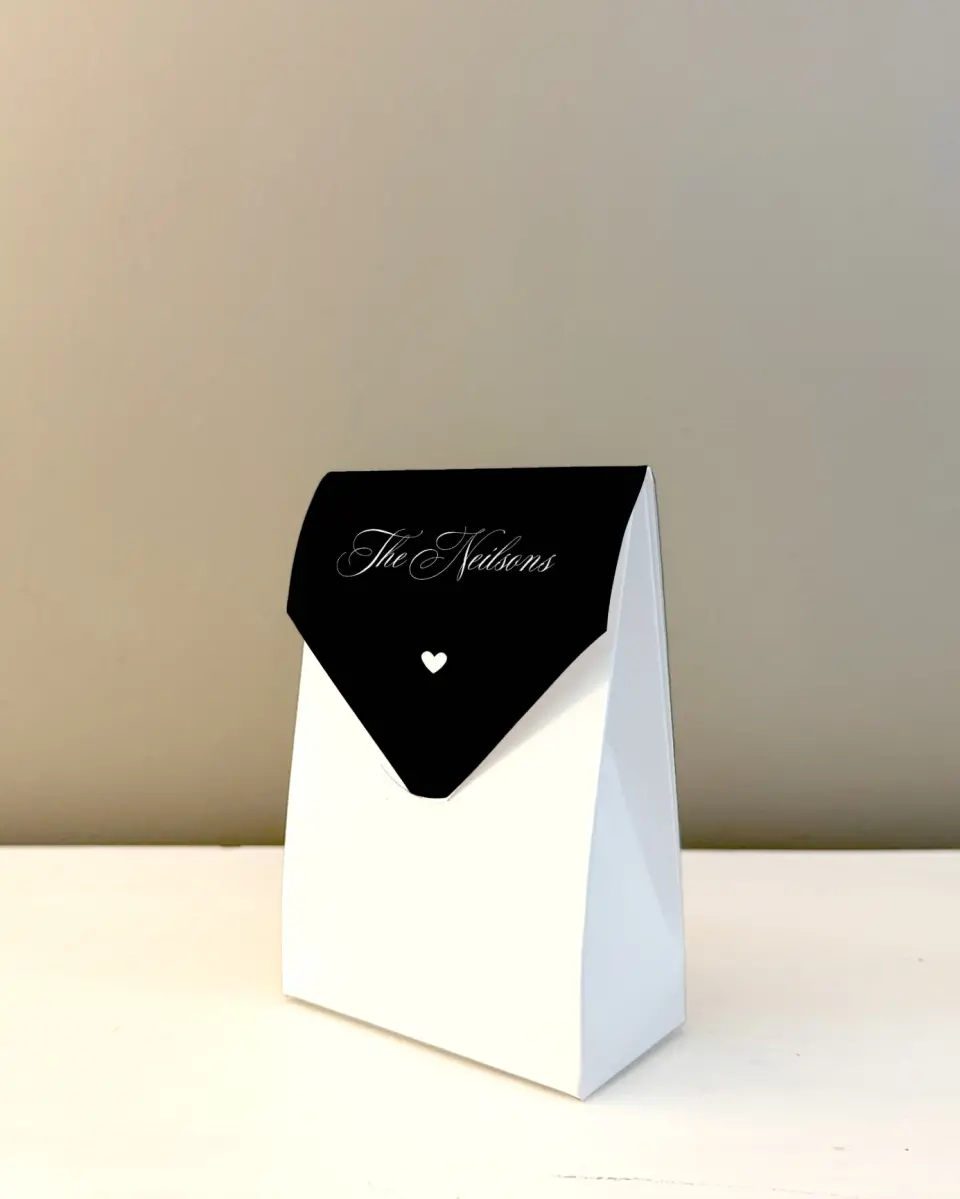 This is a 3.5" x 5.5" Wedding Favor Boxe called Elevated Vegas printed in full color with Silver foil