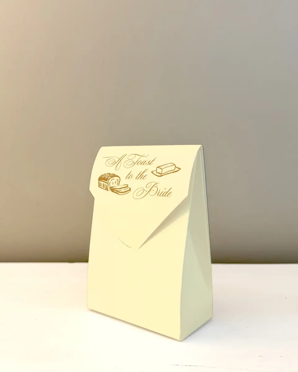 This is a 3.5" x 5.5" Wedding Favor Boxe called Toast to the Bride printed in full color with Rose Gold foil