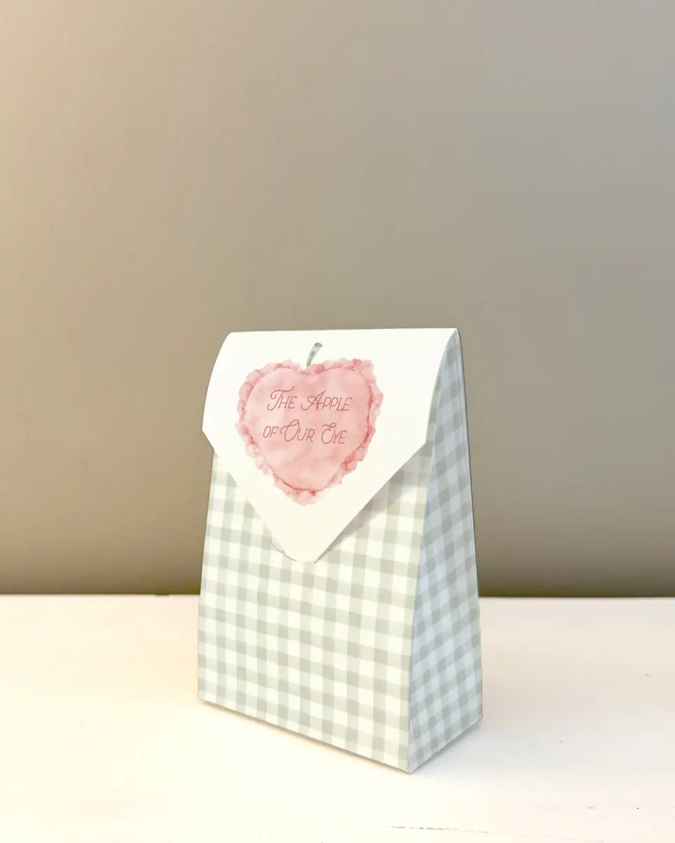 This is a 3.5" x 5.5" Wedding Favor Boxe called Apple of Our Eye printed in full color with Gold foil