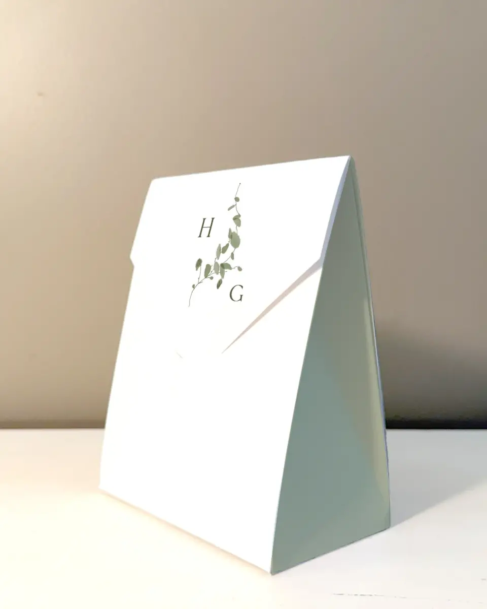 This is a 5" x 7" Wedding Favor Boxe called The Hailey printed in full color with Rose Gold foil