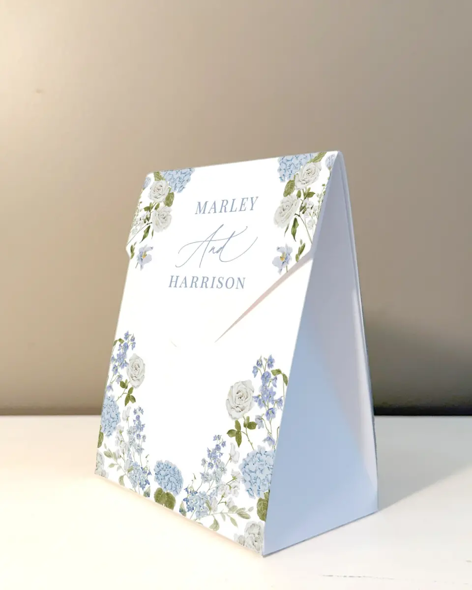 This is a 5" x 7" Wedding Favor Boxe called Blue Blossoms printed in full color with Rose Gold foil