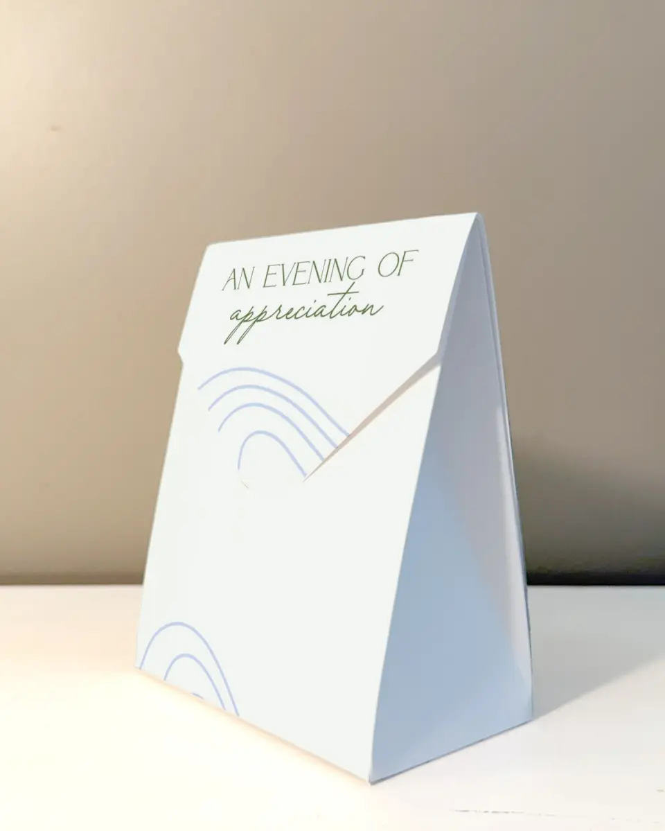 This is a 5" x 7" Business Favor Boxe called Contoured Connection printed in full color with Rose Gold foil