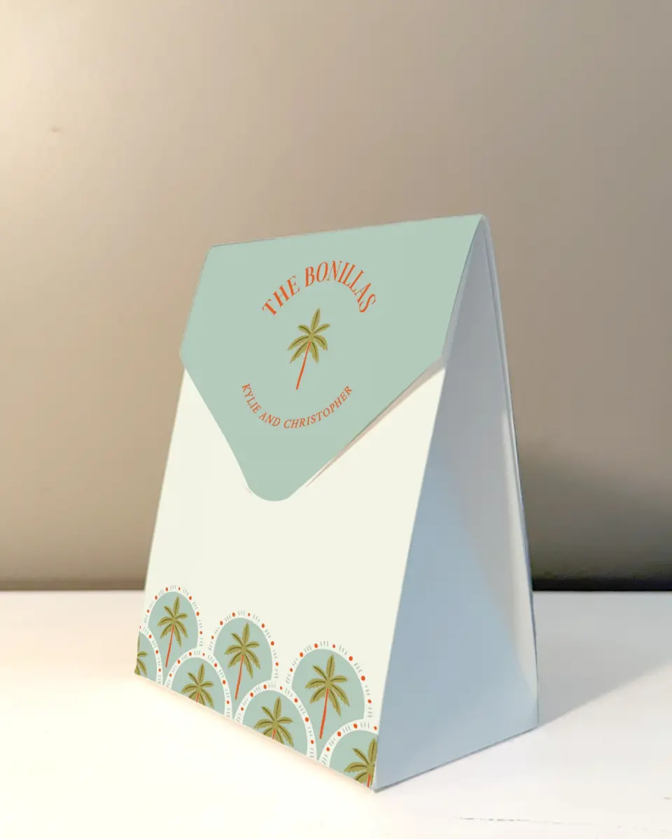 This is a 5" x 7" Wedding Favor Boxe called Tropical Treasure printed in full color with Rose Gold foil