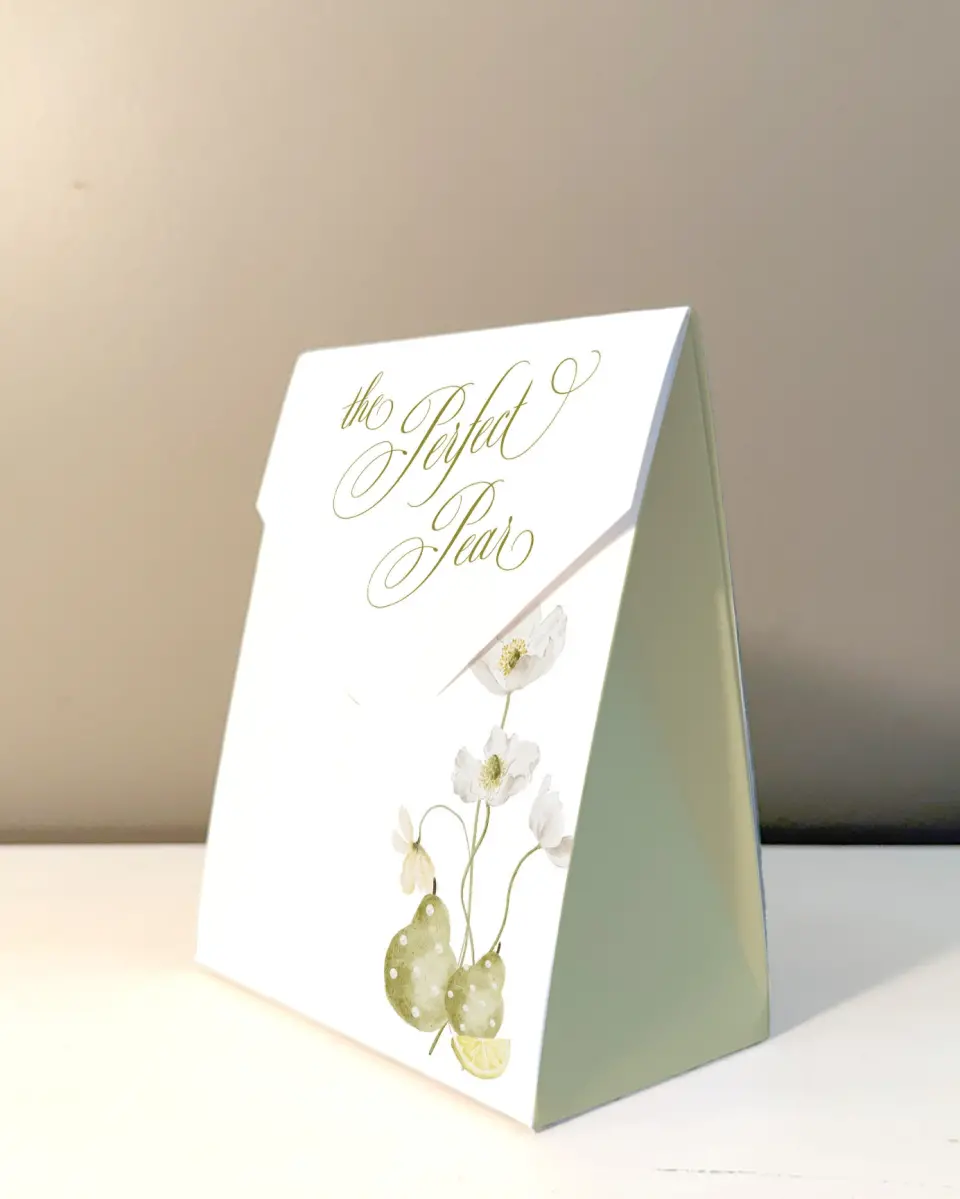 This is a 5" x 7" Wedding Favor Boxe called Perfect Pear printed in full color with Rose Gold foil