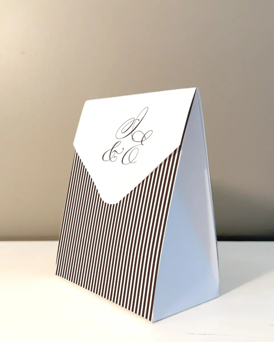 This is a 5" x 7" Wedding Favor Boxe called The Isabelle printed in full color with Rose Gold foil