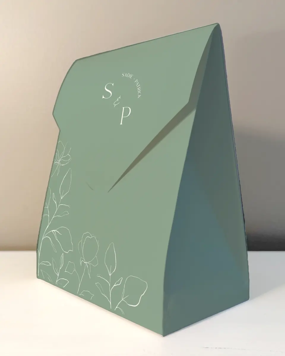 This is a 6.5" x 9" Wedding Favor Boxe called The Sadie printed in full color with Gold foil