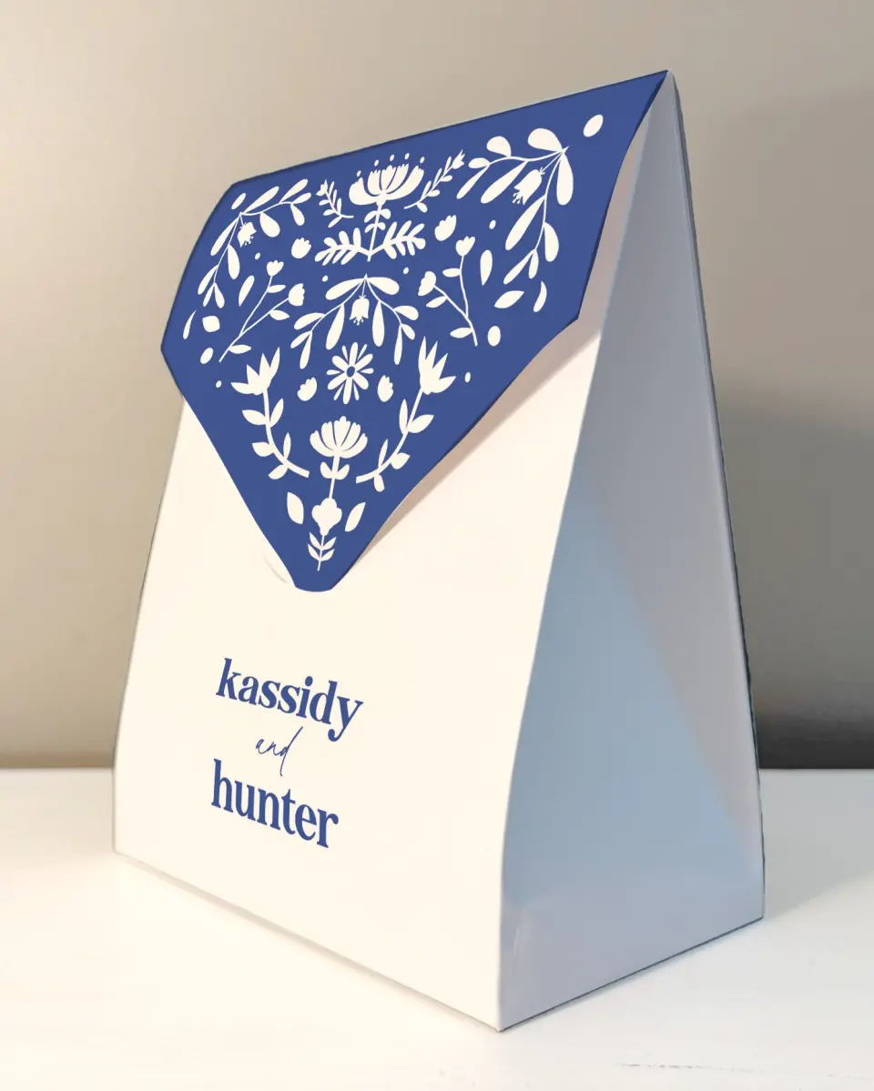 This is a 6.5" x 9" Wedding Favor Boxe called The Kassidy printed in full color with Rose Gold foil