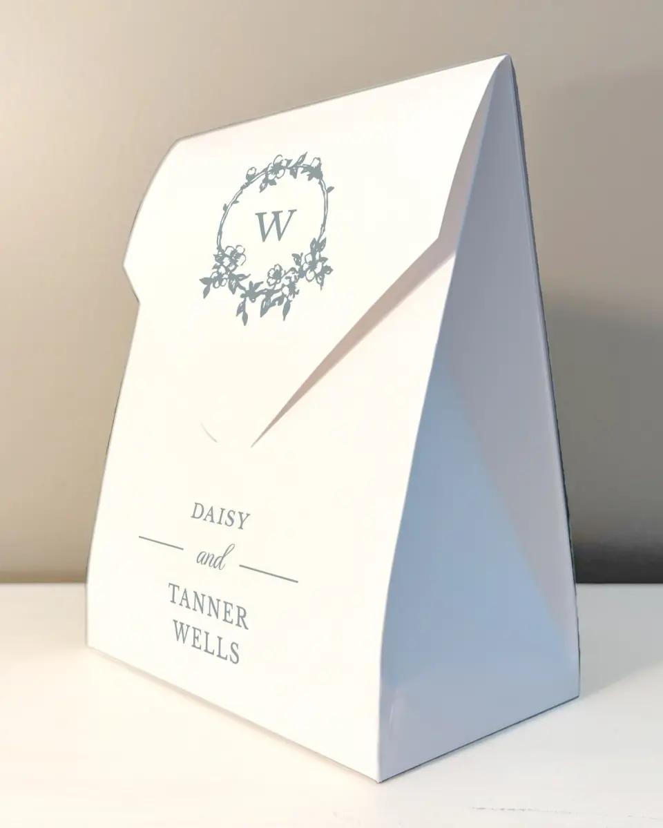 This is a 6.5" x 9" Wedding Favor Boxe called Flowering Frame printed in full color with Rose Gold foil