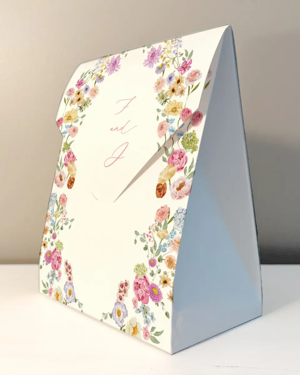 This is a 6.5" x 9" Wedding Favor Boxe called The Florence printed in full color with Rose Gold foil