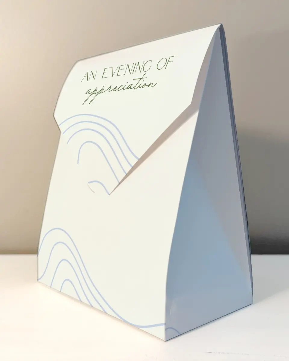 This is a 6.5" x 9" Business Favor Boxe called Contoured Connection printed in full color with Rose Gold foil