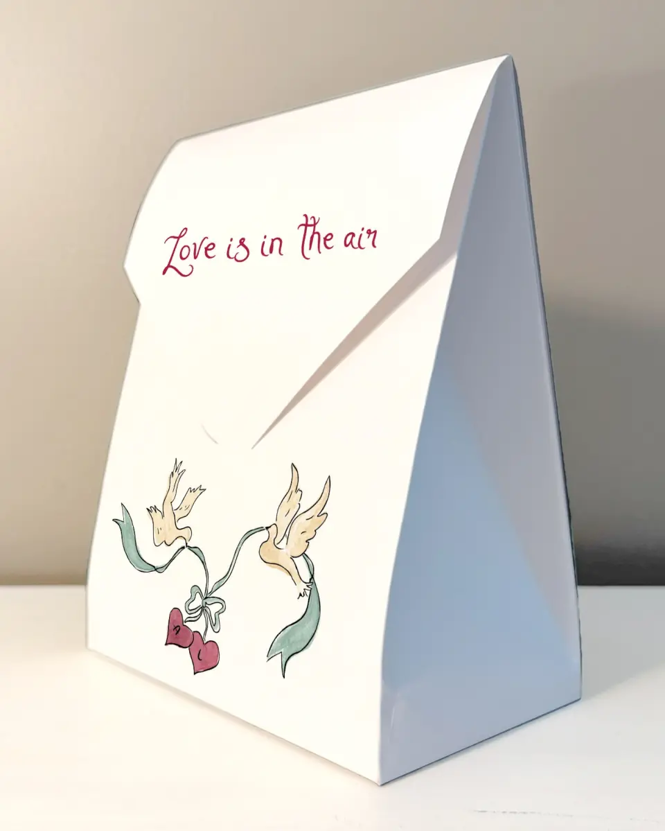 This is a 6.5" x 9" Wedding Favor Boxe called Love Dove printed in full color with Rose Gold foil