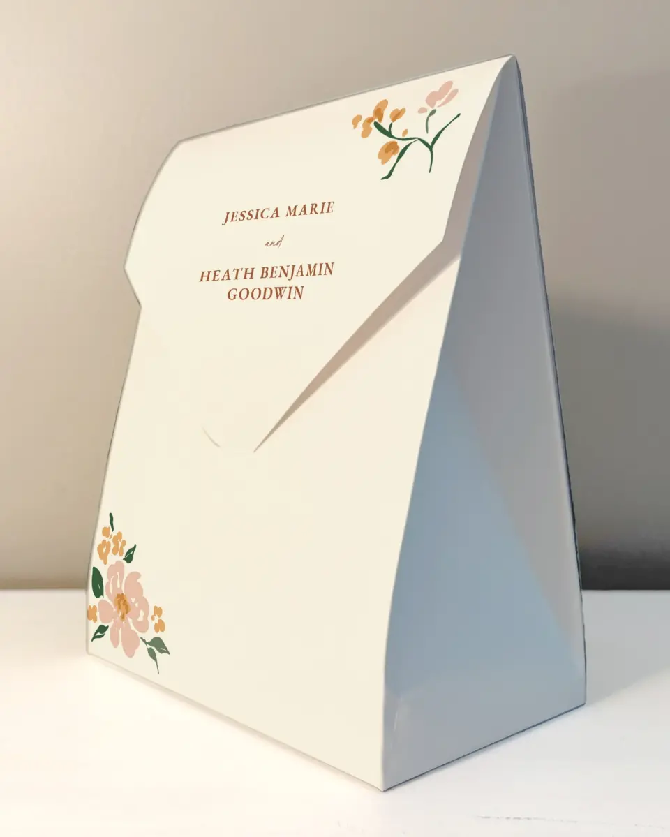 This is a 6.5" x 9" Wedding Favor Boxe called Plush Petals printed in full color with Rose Gold foil