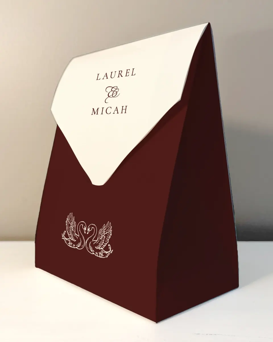 This is a 6.5" x 9" Wedding Favor Boxe called Swan Song printed in full color with Rose Gold foil