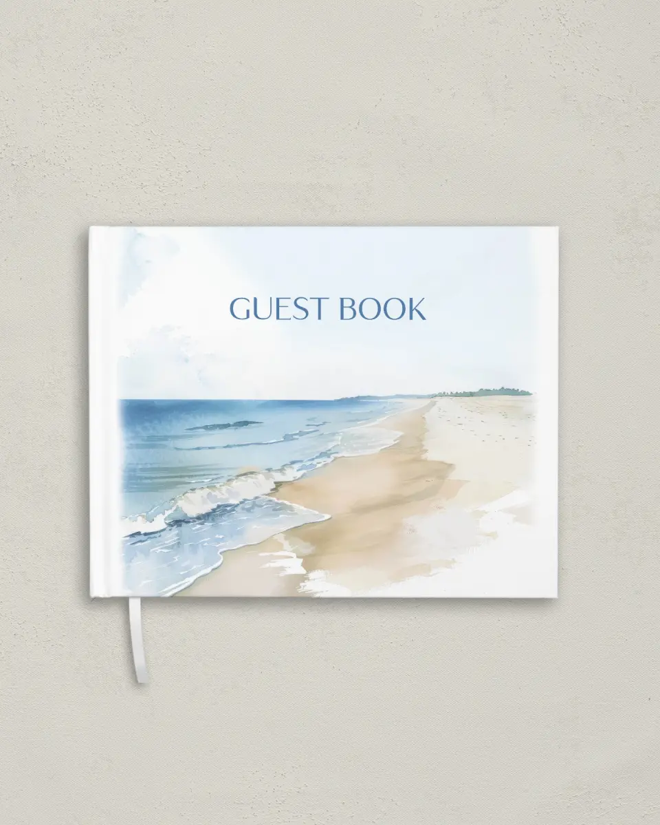 This is a 10½" x 8¼" Wedding Guest Book called Seaside Serenade printed in full color with Rose Gold foil