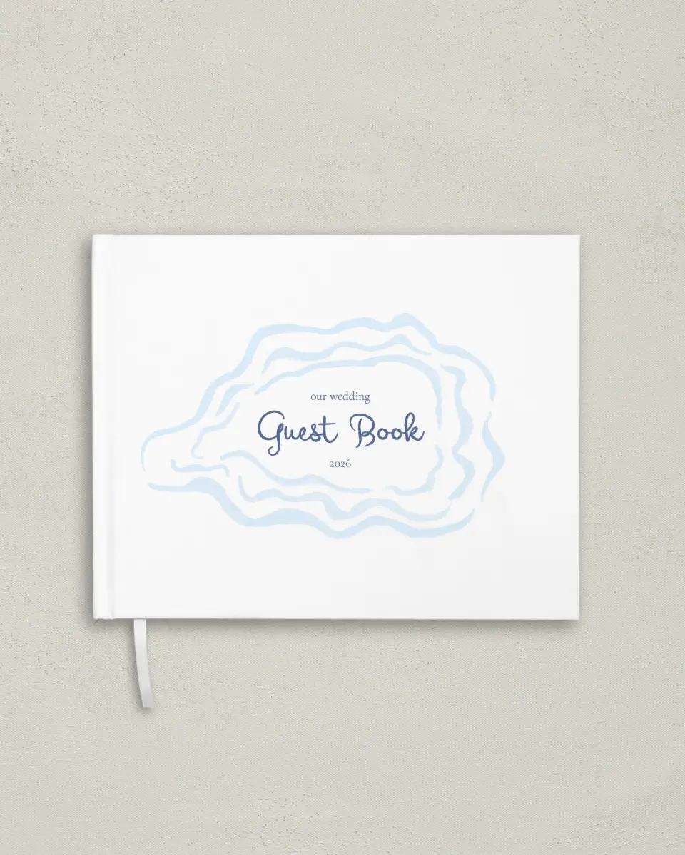 This is a 10½" x 8¼" Wedding Guest Book called Love by the Sea printed in full color with Gold foil