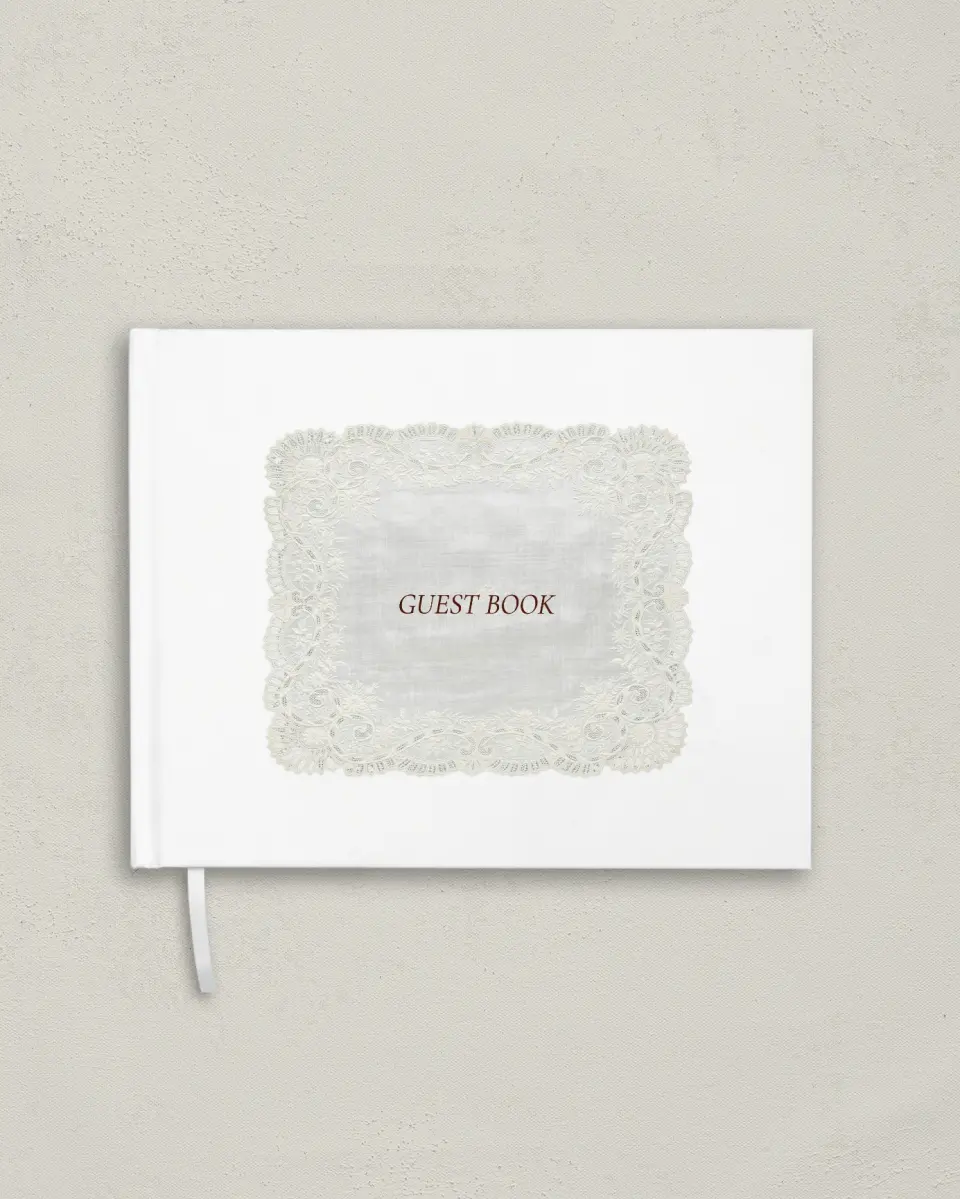 This is a 10½" x 8¼" Wedding Guest Book called Trimmed Lace printed in full color
