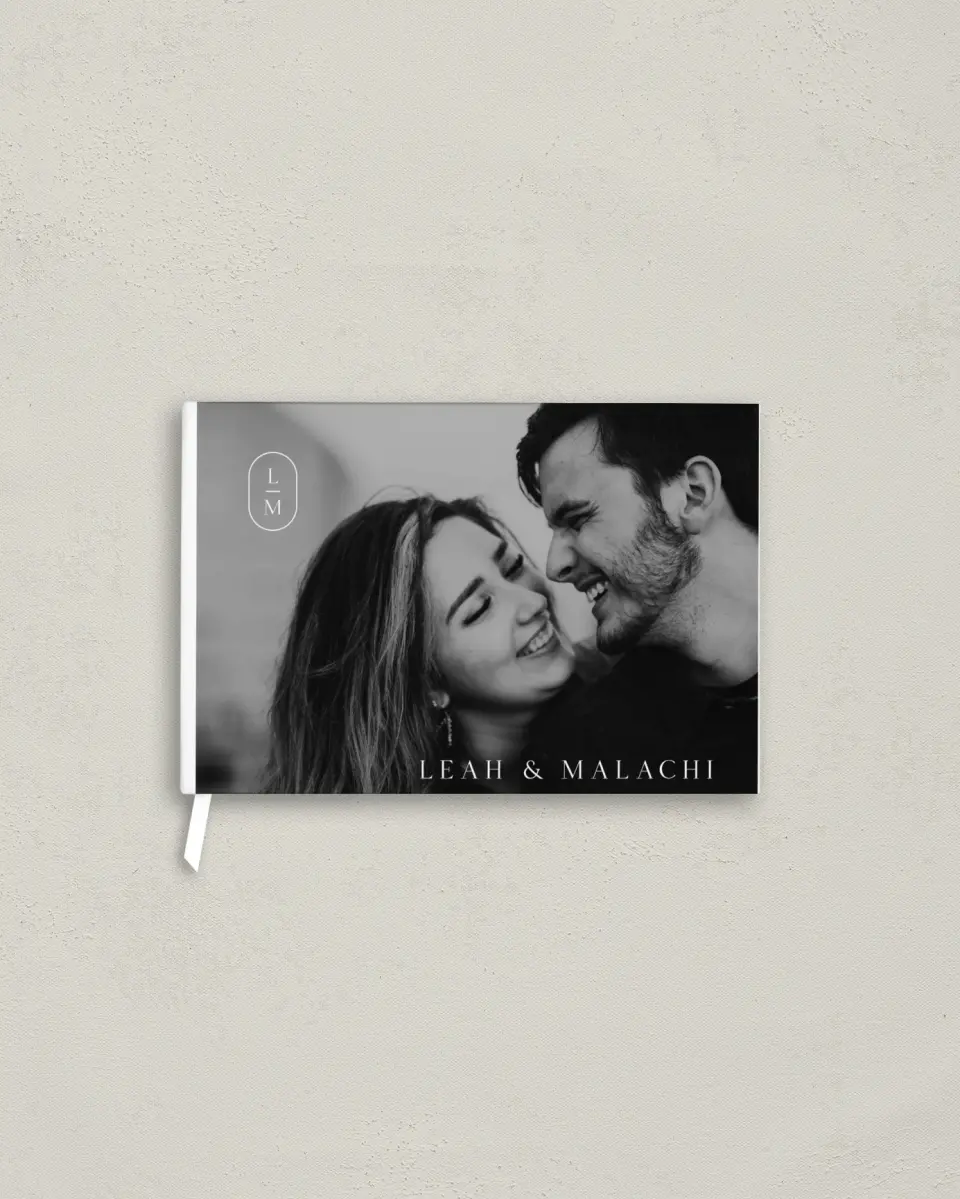 This is a 9" x 6" Wedding Guest Book called Precise Promise printed in full color with Silver foil
