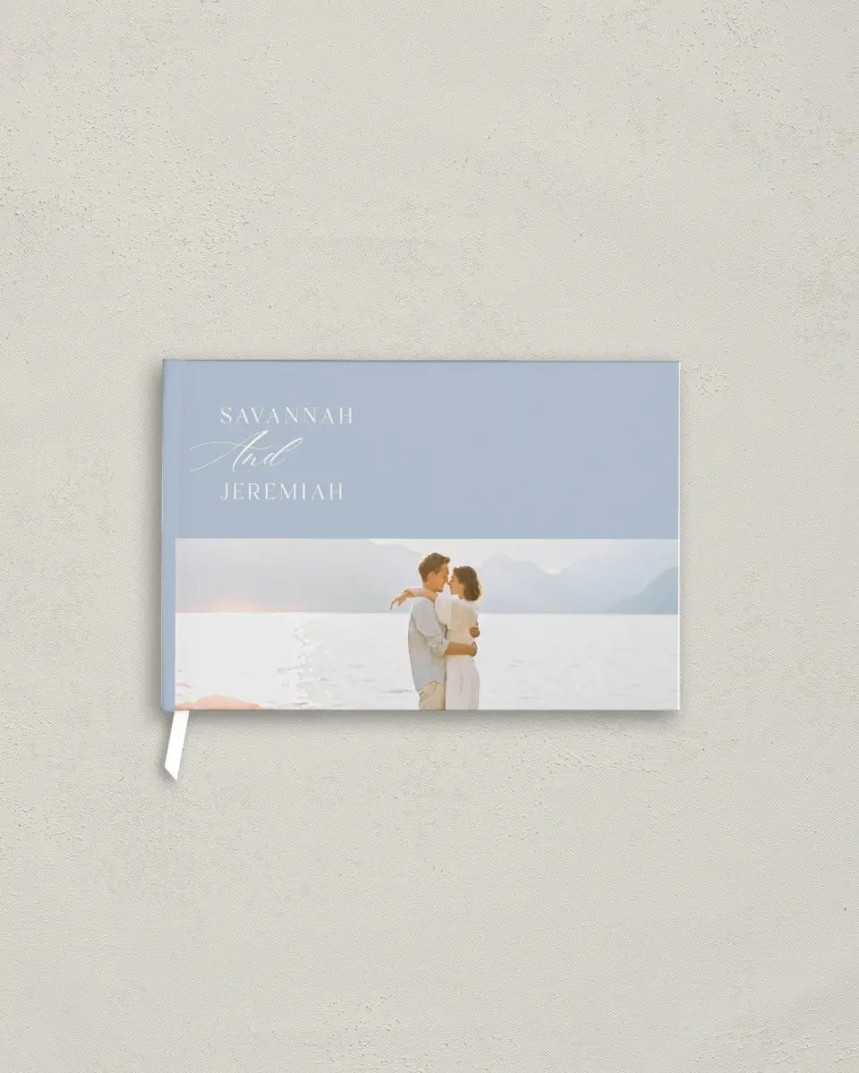This is a 9" x 6" Wedding Guest Book called The Savannah printed in full color with Silver foil