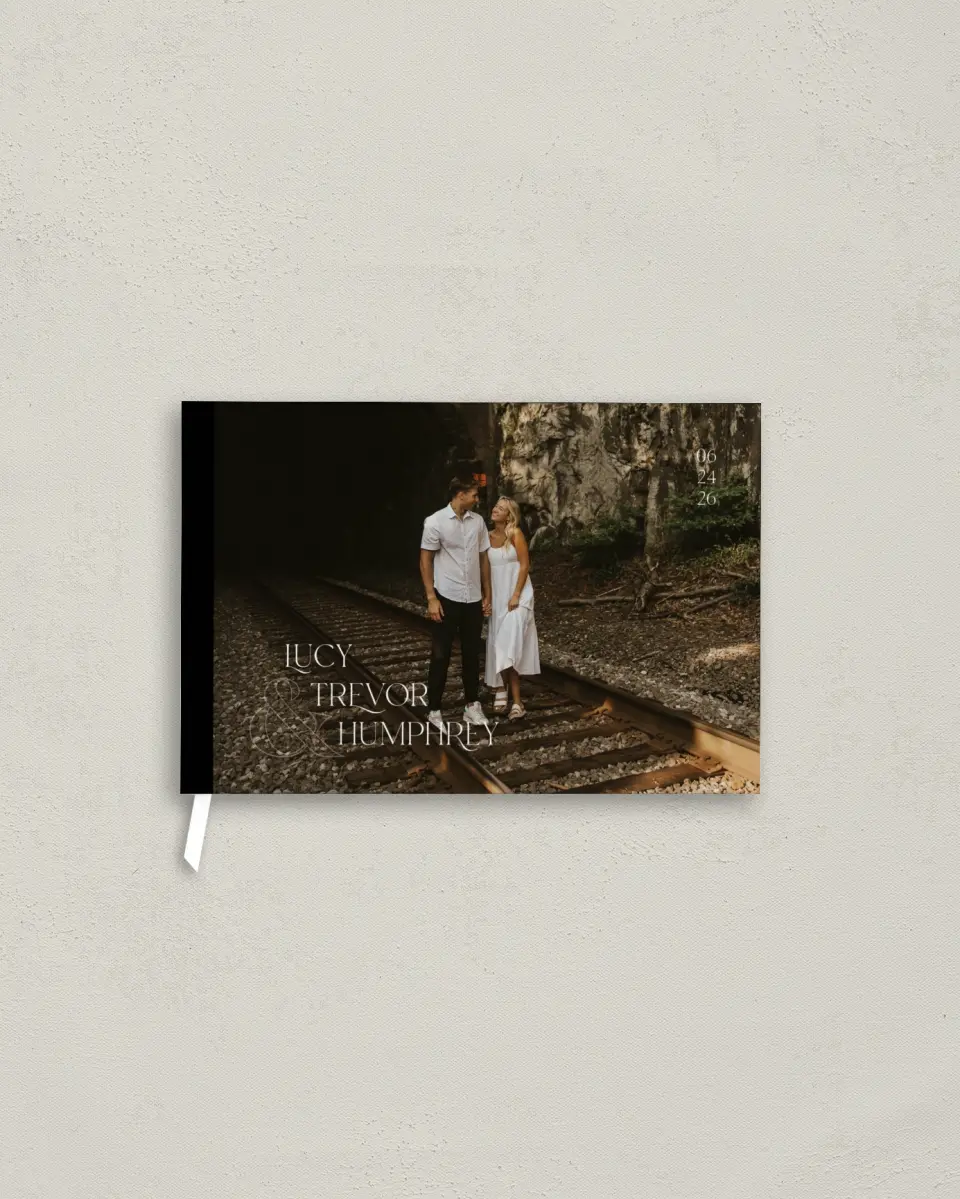 This is a 9" x 6" Wedding Guest Book called The Lucy printed in full color with Silver foil