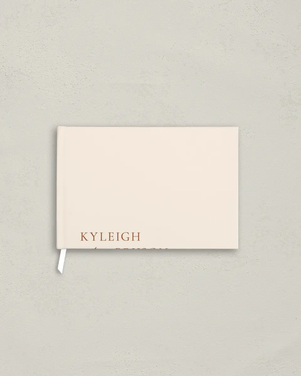 This is a 9" x 6" Wedding Guest Book called The Kyleigh printed in full color with Silver foil