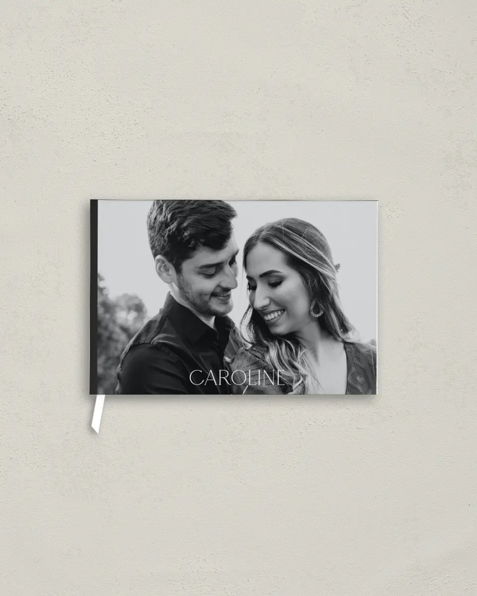 This is a 9" x 6" Wedding Guest Book called The Caroline printed in full color with Silver foil