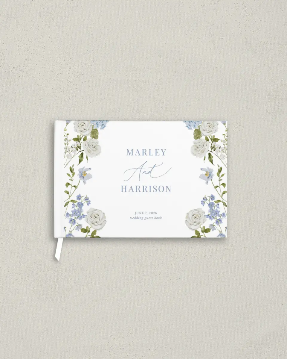 This is a 9" x 6" Wedding Guest Book called Blue Blossoms printed in full color with Silver foil