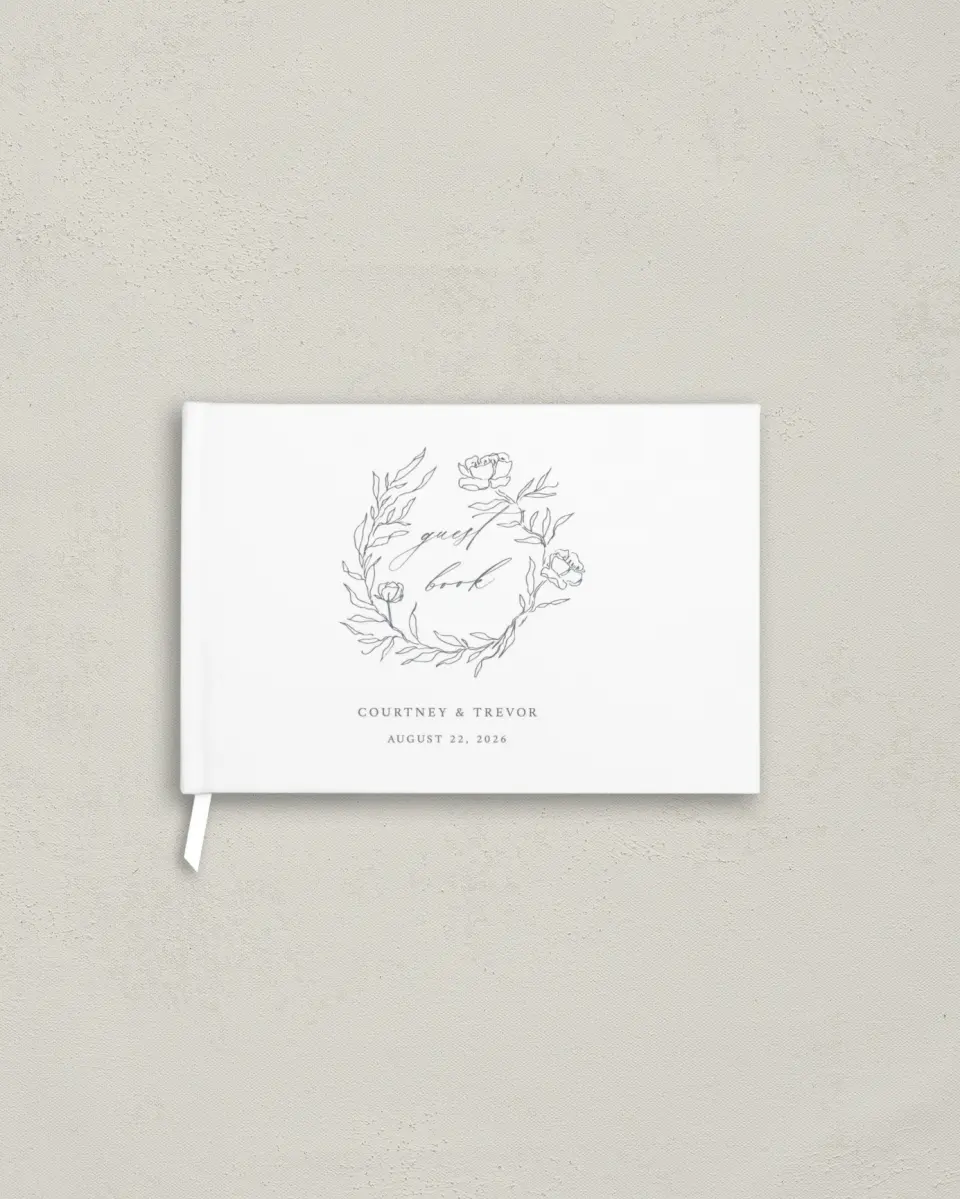 This is a 9" x 6" Wedding Guest Book called Whispering Wreath printed in full color