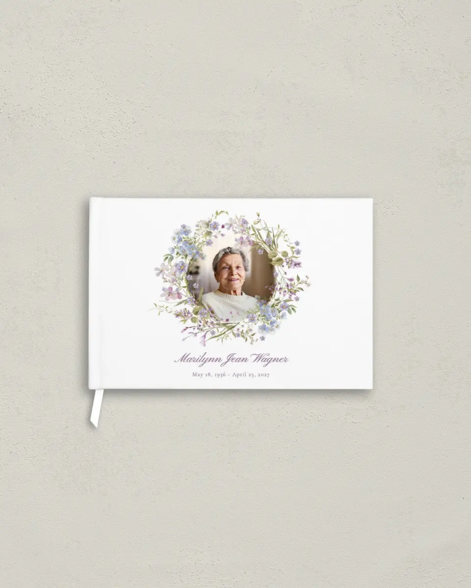 This is a 9" x 6" Memorial Guest Book called Forever Blooming printed in full color