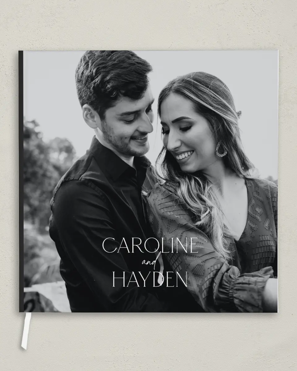This is a 12" x 12" Wedding Guest Book called The Caroline printed in full color with Gold foil