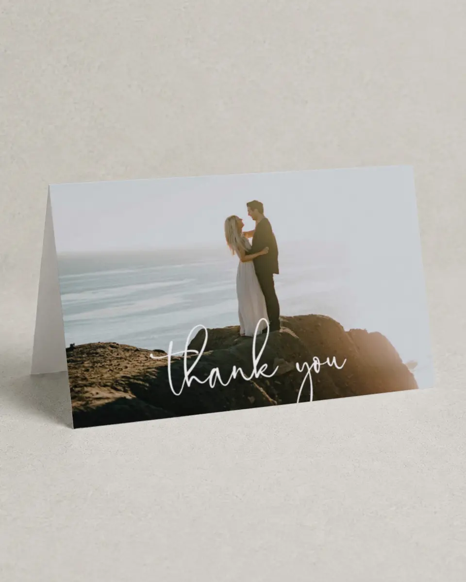 This is a 4" x 6" Folded Thank You Card called Enchanting Sea printed in full color with Silver foil on Luxe Satin (coated) paper