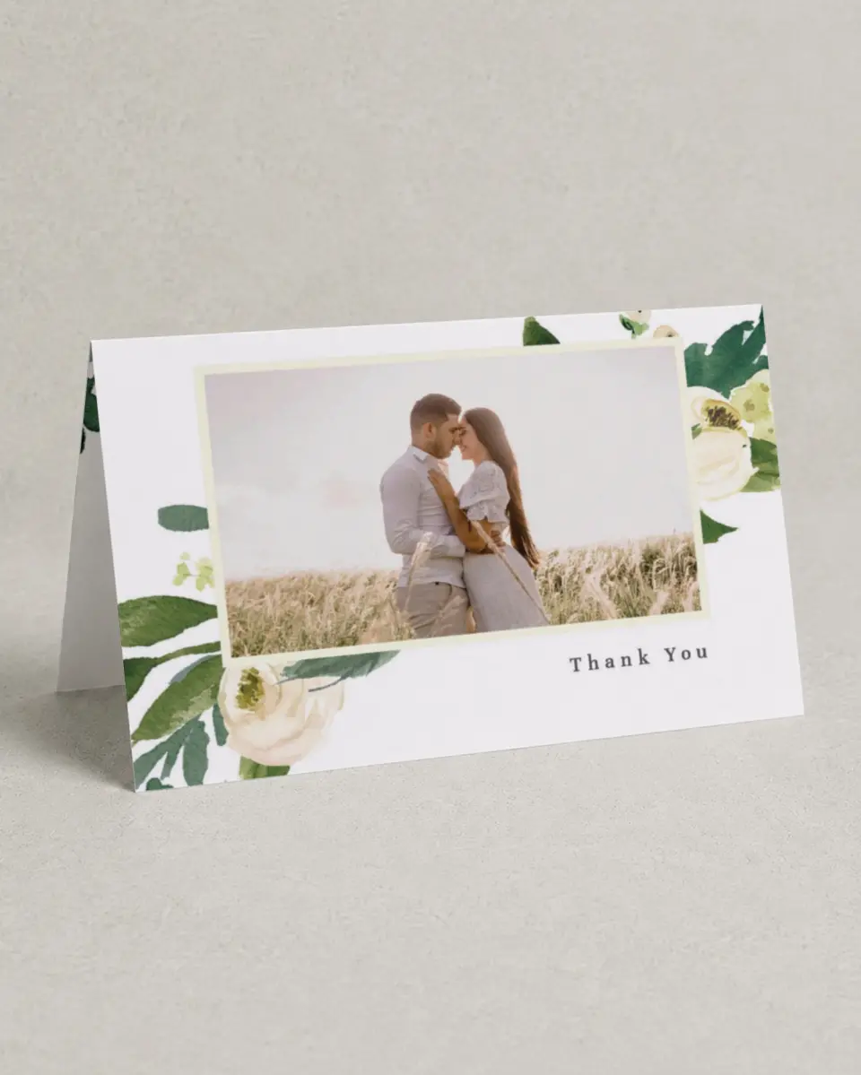 This is a 4" x 6" Folded Thank You Card called Wedding Florals printed in full color with Silver foil on Luxe Satin (coated) paper