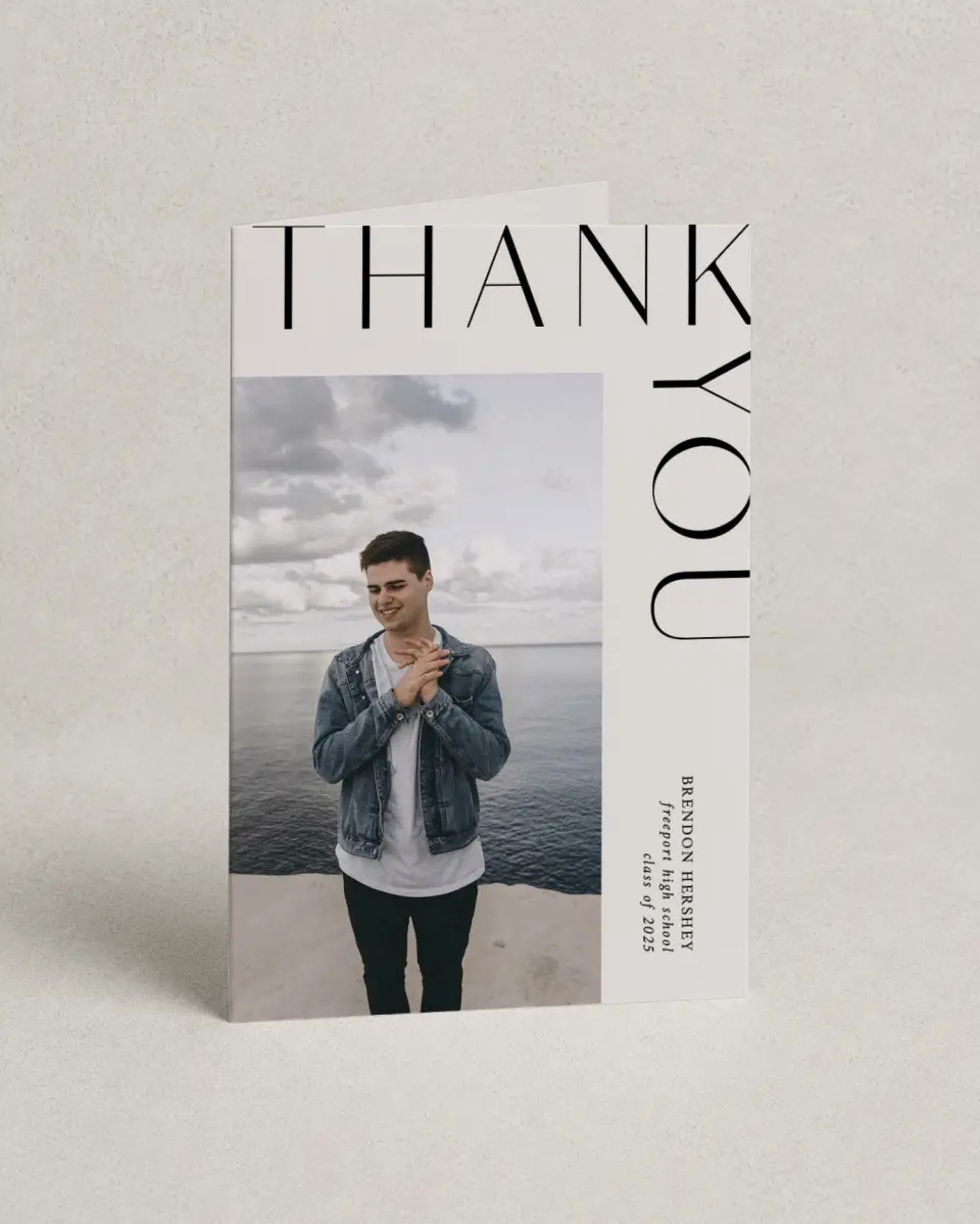 This is a 4" x 6" Folded Graduation Thank You Card called On the Edge printed in full color with Silver foil on Luxe Satin (coated) paper