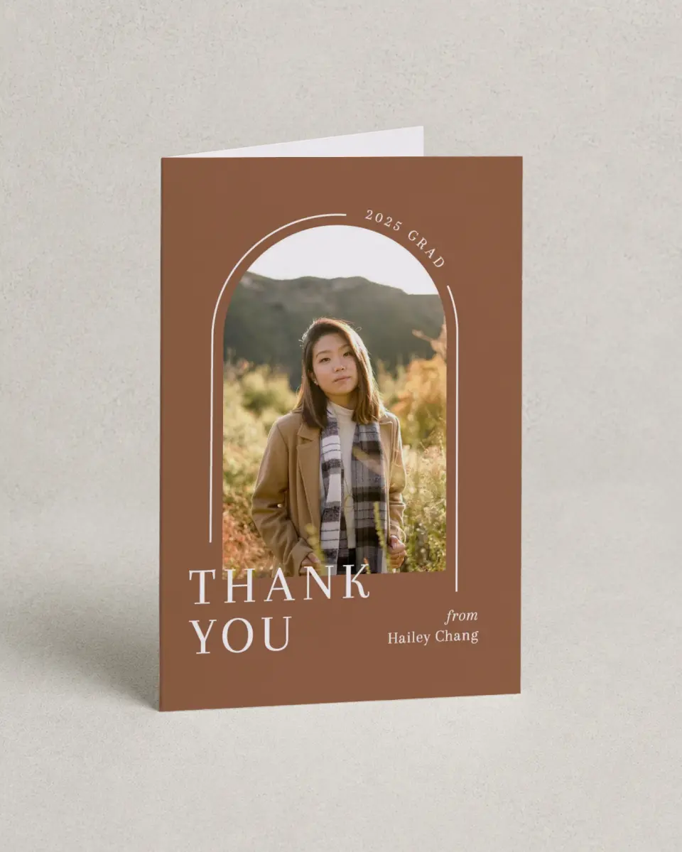 This is a 4" x 6" Folded Graduation Thank You Card called Arched Grad printed in full color with Gold foil on Luxe Satin (coated) paper