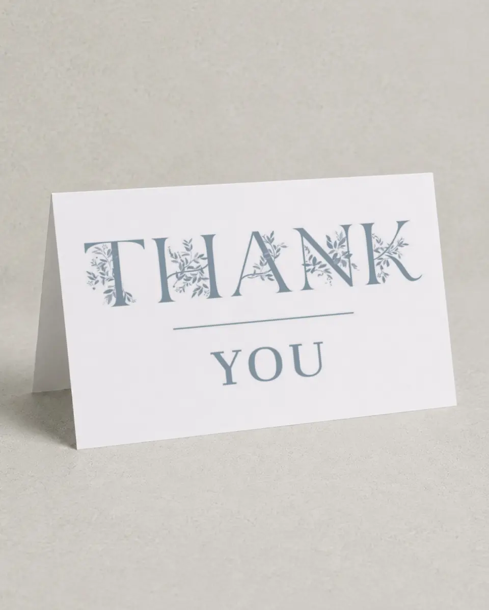 This is a 4" x 6" Folded Baby Shower Thank You Card called Floral Boy printed in full color on Premium Smooth paper