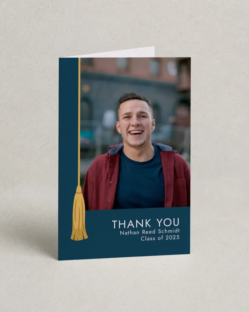 This is a 4" x 6" Folded Graduation Thank You Card called Grad Tassel printed in full color with Rose Gold foil on Luxe Satin (coated) paper