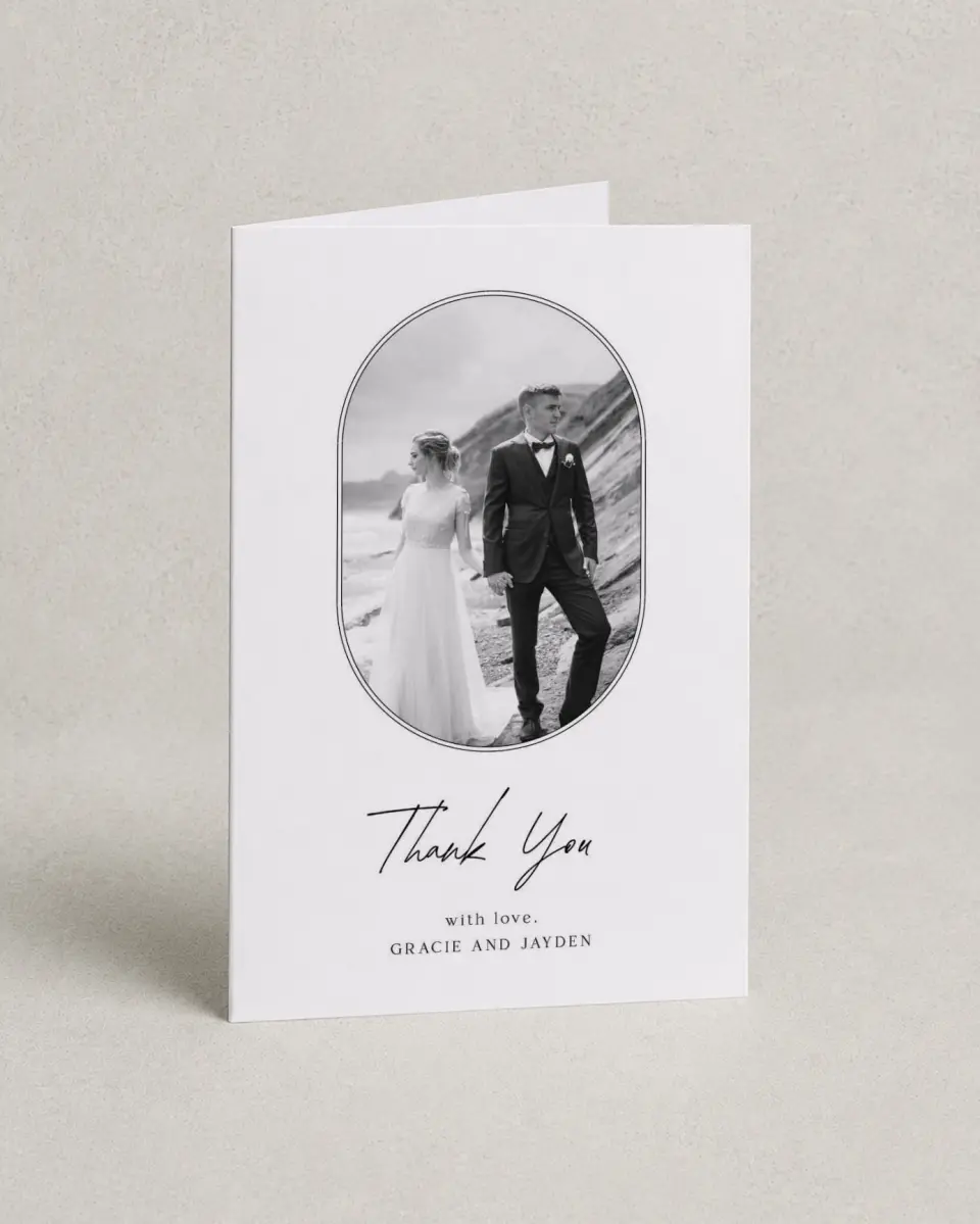 This is a 4" x 6" Folded Thank You Card called Dramatic Date printed in full color with Silver foil on Luxe Satin (coated) paper