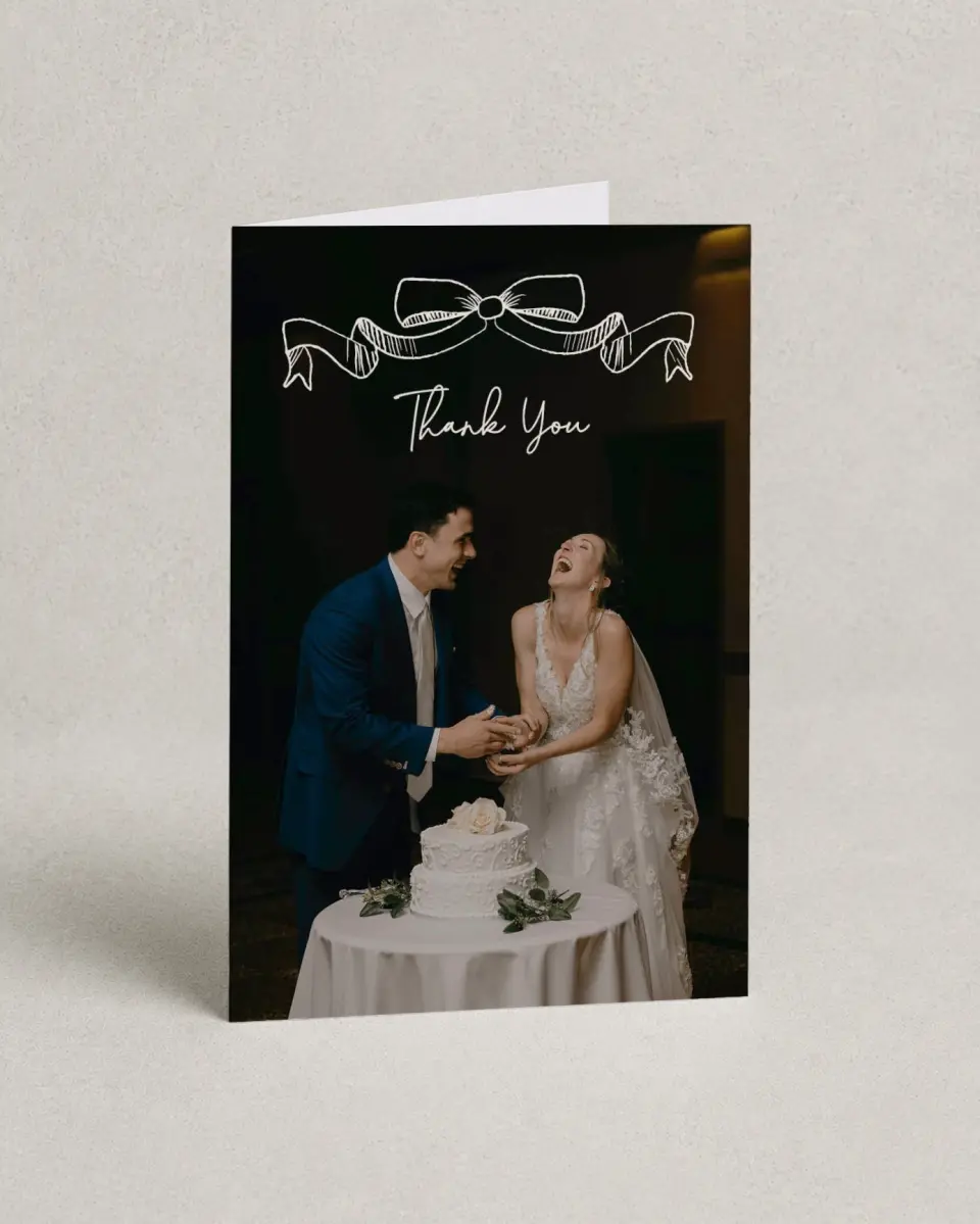 This is a 4" x 6" Folded Thank You Card called Sketched Bow printed in full color with Gold foil on Luxe Satin (coated) paper