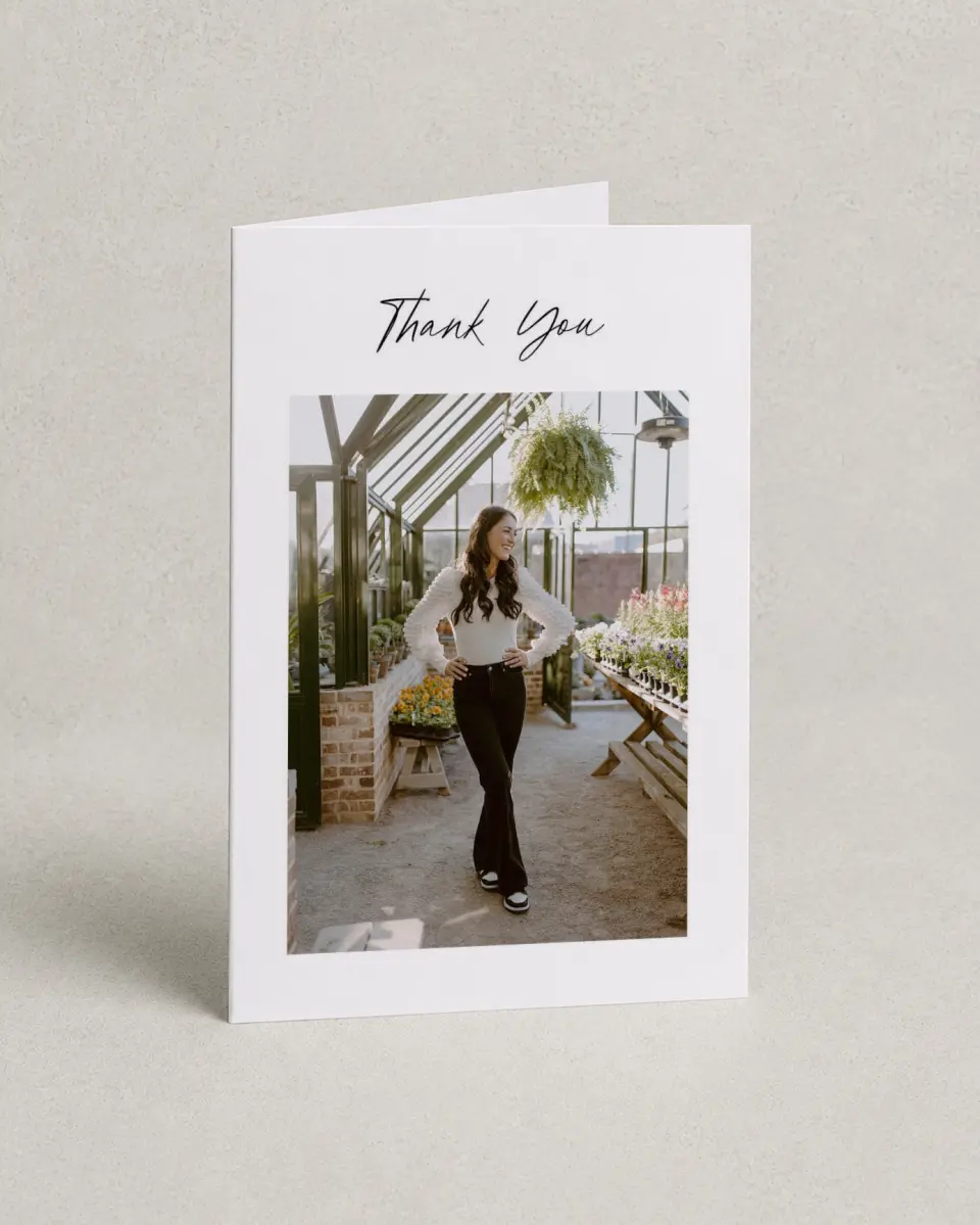 This is a 4" x 6" Folded Graduation Thank You Card called Timeless Graduate printed in full color with Rose Gold foil on Luxe Satin (coated) paper