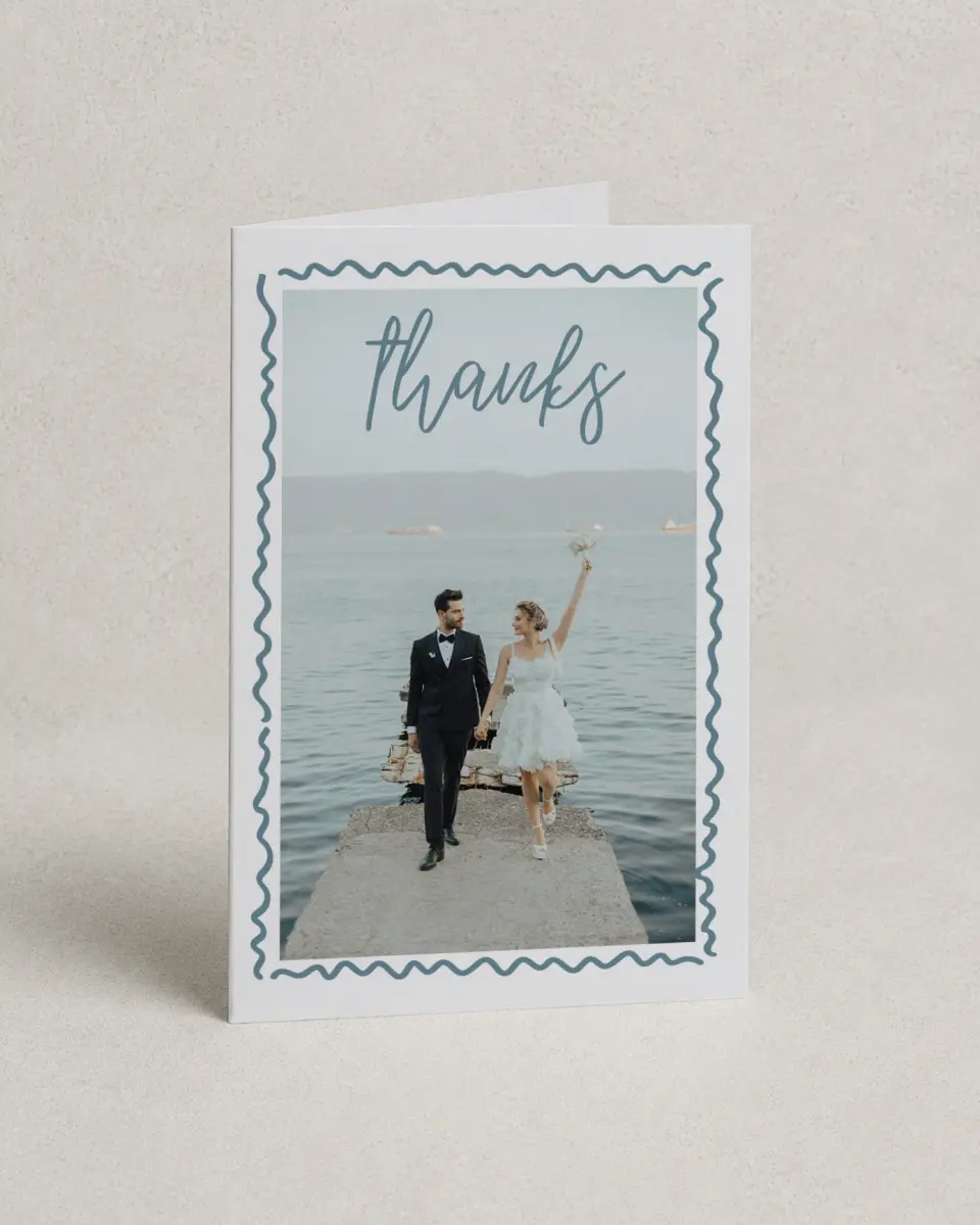 This is a 4" x 6" Folded Thank You Card called I Hear Wedding Shells printed in full color on Premium Smooth paper