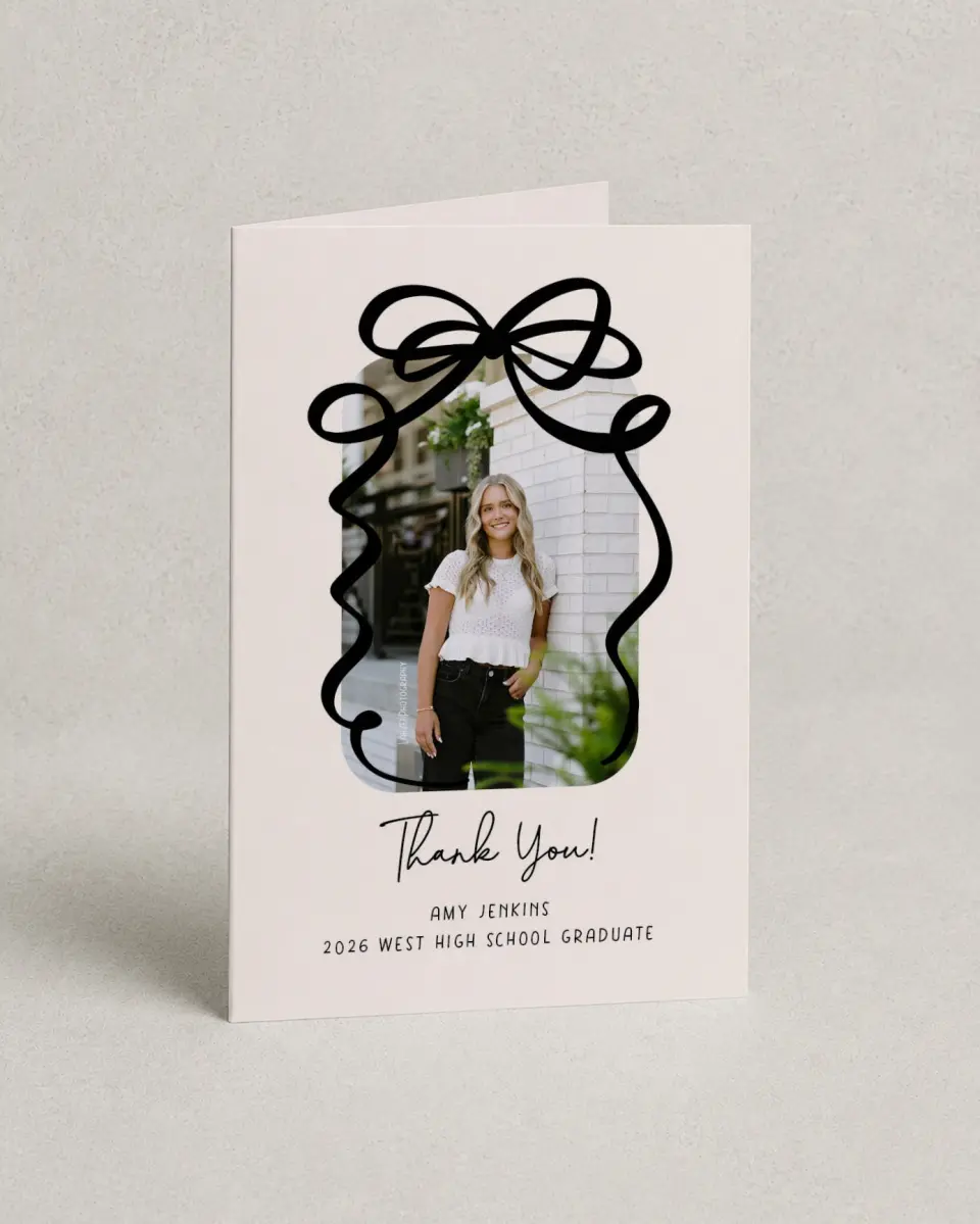 This is a 4" x 6" Folded Graduation Thank You Card called All Tied Up printed in full color with Rose Gold foil on Luxe Satin (coated) paper