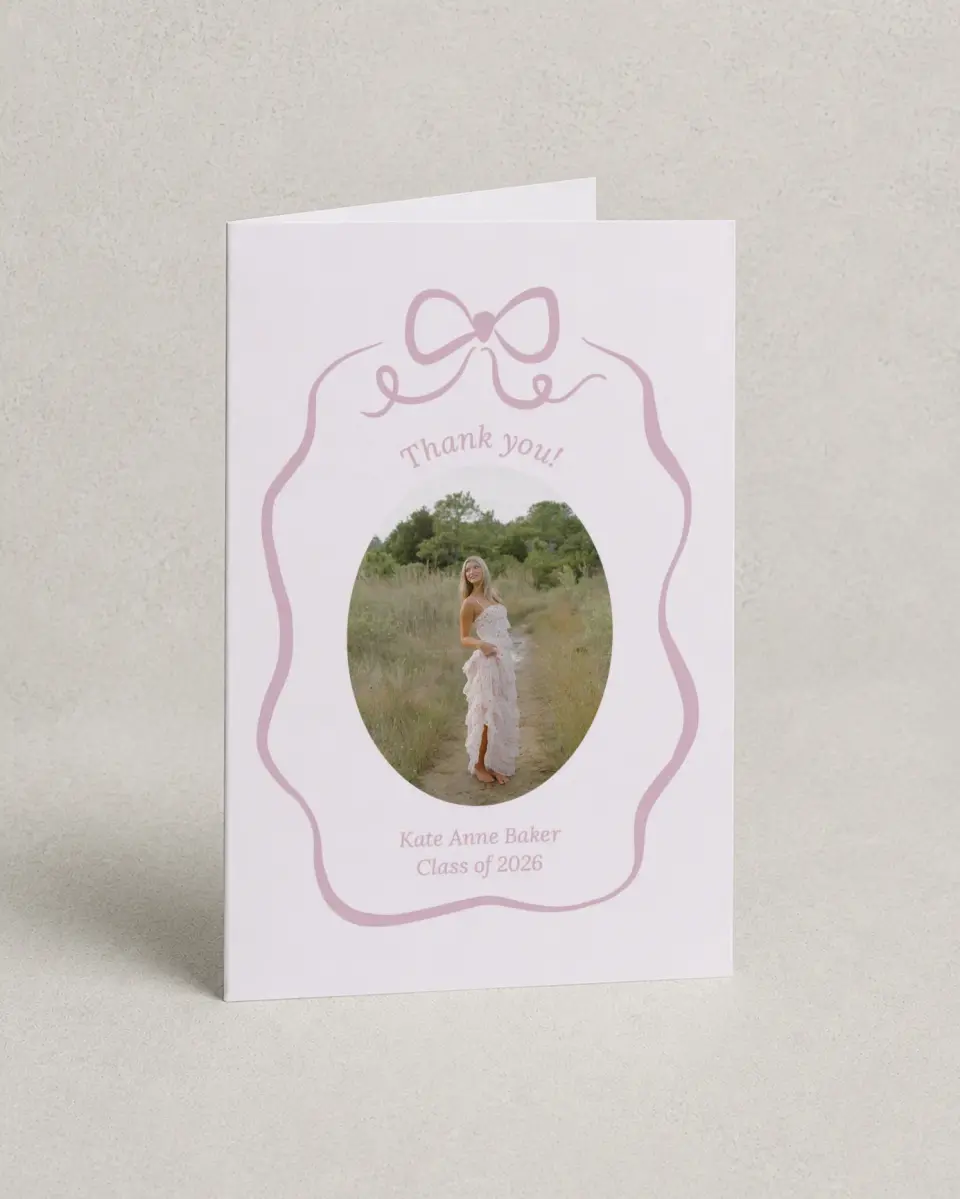This is a 4" x 6" Folded Graduation Thank You Card called Bow Grad printed in full color with Rose Gold foil on Luxe Satin (coated) paper