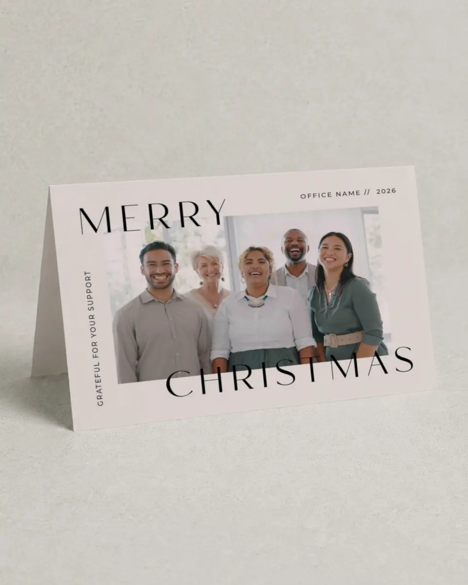 This is a 4.8" x 6.8" Folded Christmas Card called Office Christmas printed in full color