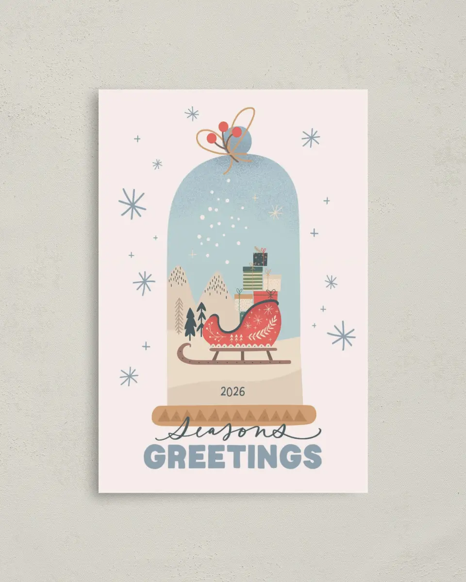 This is a 4.8" x 6.8" Folded Christmas Card called Seasonal Snow Globe printed in full color