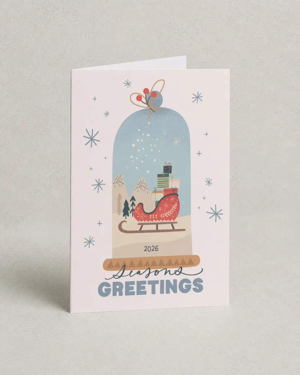 This is a 4.8" x 6.8" Folded Christmas Card called Seasonal Snow Globe printed in full color