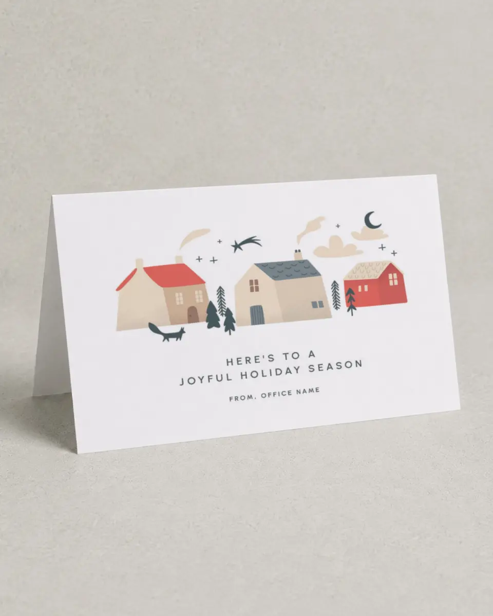 This is a 4.8" x 6.8" Folded Christmas Card called Cozy Village printed in full color