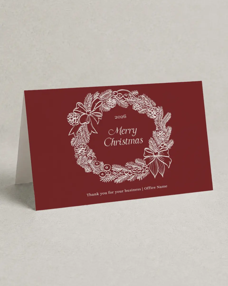 This is a 4.8" x 6.8" Folded Christmas Card called Wreath Tidings printed in full color with Rose Gold foil