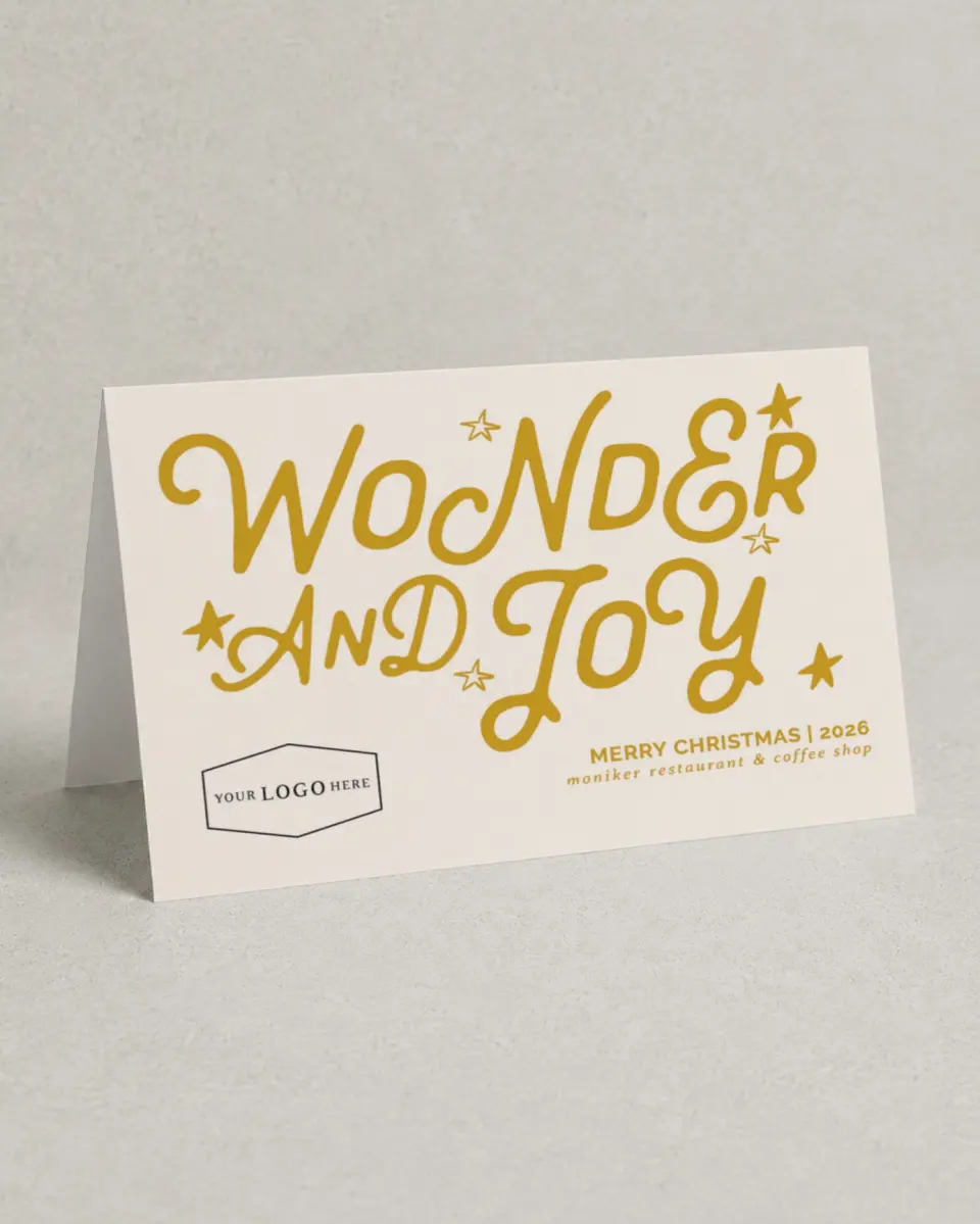 This is a 4.8" x 6.8" Folded Christmas Card called Wonder & Joy printed in full color with Silver foil
